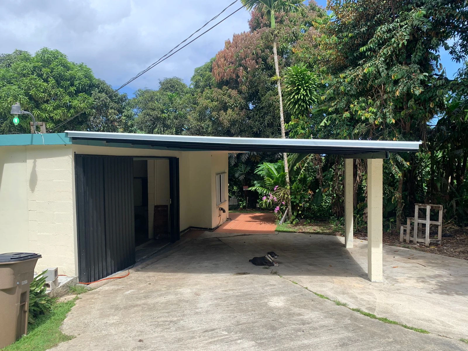 Metal carport and driveway
