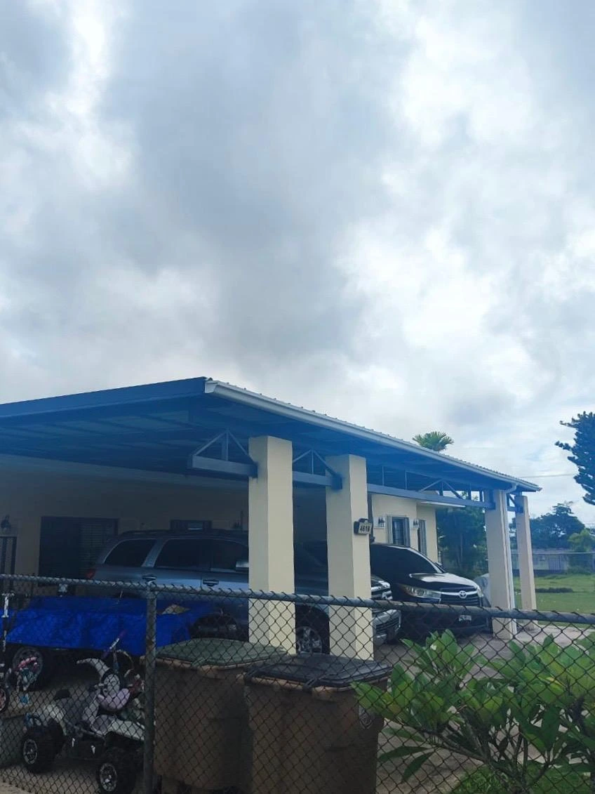 Metal carport and driveway